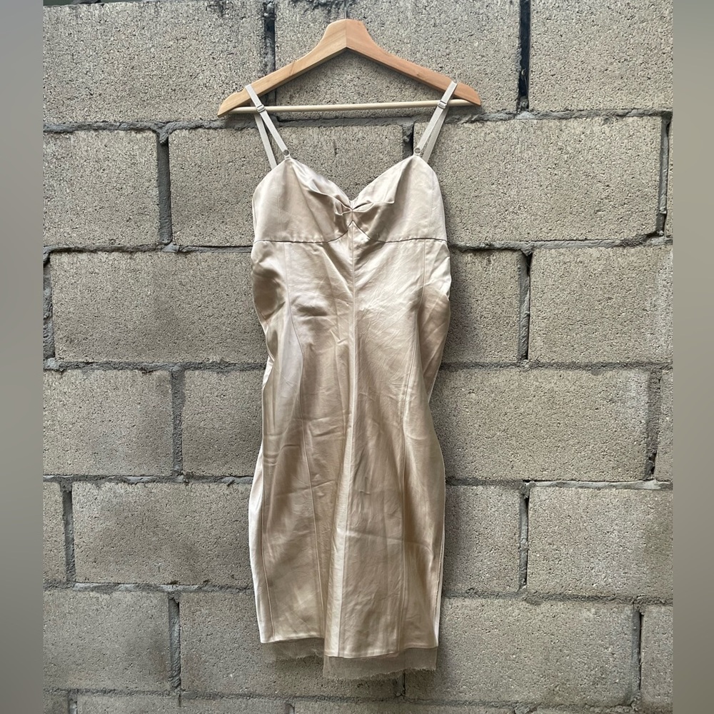 Gold Marc Jacobs dress in a US size 0. Really interesting shape on the sides
